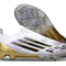 F50 Elite Laceless FG Road to Glory - Blanc/Noir/Doré