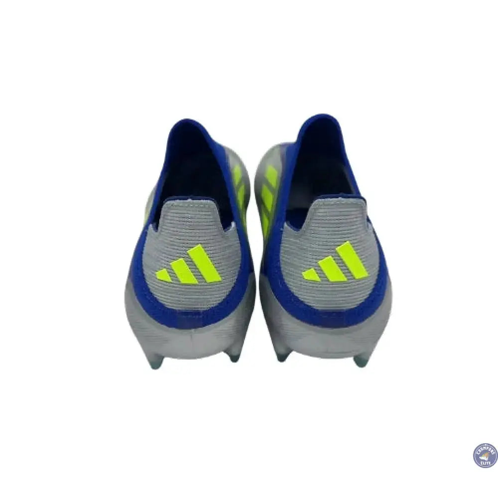 F50 Laceless MESSI Elite FG LA VIDA RAPIDA - ARGENTÉ/JAUNE/BLEU